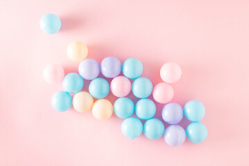 balls kids on a pink backround. Minimal concept. Flat lay.