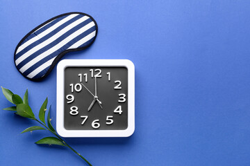 Composition with stylish clock on color background