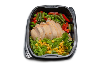Ready food in a container. Stewed chicken, stewed vegetables.