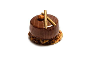 Chocolate and caramel cake isolated on a white background.
