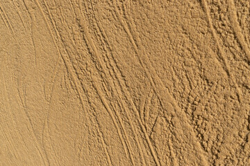 Decorative acrylic sandy plaster texture on wall outside
