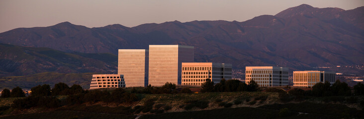 Twilight panoramic view of the skyline of downtown Irvine, California, USA.