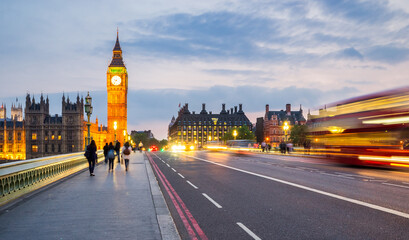 Big Ben clock seen from Westminster bridge at sunset in London. England