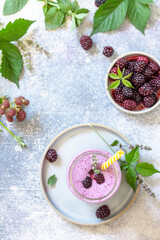 Natural healthy detox, fruit dessert, healthy dieting concept. Blackberry milk shake or Yogurt...