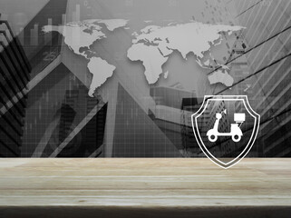Motorcycle with shield flat icon on wooden table over black and white world map, city tower and skyscraper, Business motorbike insurance concept, Elements of this image furnished by NASA