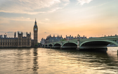 Fototapeta na wymiar Big Ben and Westminster bridge at sunset in London. Enggland