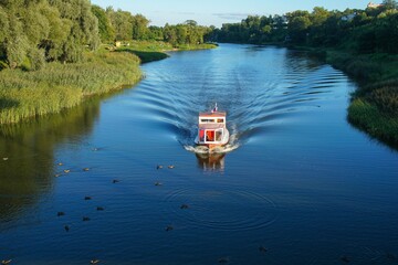 Russia. Tambov region. Tambov. A boat trip on the Tsna River on a summer sunny day
