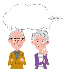 飛行機旅行を計画しているシニア夫婦