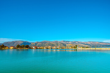 Fototapeta na wymiar Greece, Beautifull sea lake view with green waters Aitoliko in Central Greece