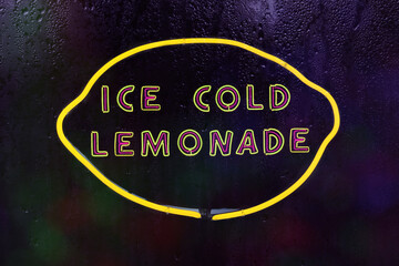 Ice Cold Lemonade Yellow Neon Sign in Rainy Window - Powered by Adobe