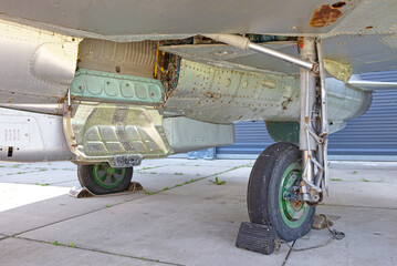 Old black flat wheel of an fighter jet