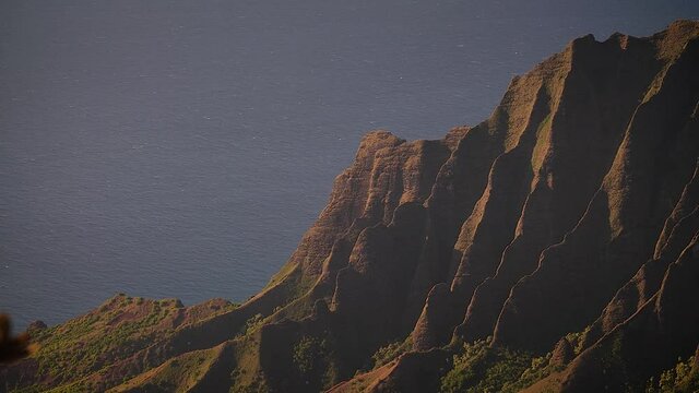 Dramatic Na Pali Coast at sunset in Kauai, Hawaii. Mid angle, parallax movement, HD.