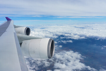 The aircraft wing with the clear blue sly