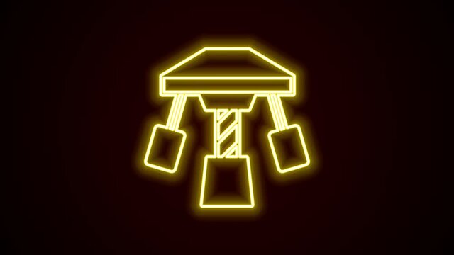Glowing neon line Attraction carousel icon isolated on black background. Amusement park. Childrens entertainment playground, recreation park. 4K Video motion graphic animation