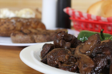 Roasted Green Jalapeno Peppers With Mushrooms in Rural Cafe