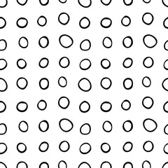 Spotty abstract vector seamless pattern. Random rings, dots, circles, spots, stains, bubbles, stones in row. Design for fabric, funny cute print. Repetitive graphic background and texture