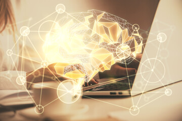 Multi exposure of woman hands working on computer and human brain hologram drawing. Ai tech concept.