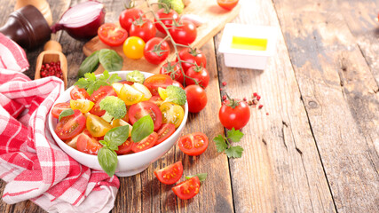 bowl of tomato salad with basil