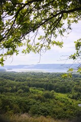 View from the hill to the mountains and the river