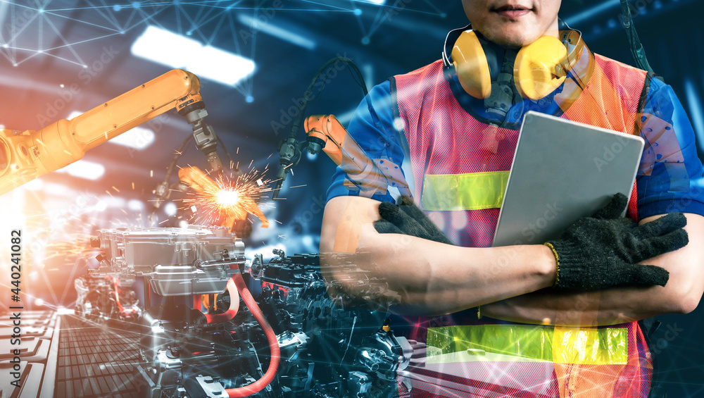 Poster mechanized industry robot arm and factory worker double exposure . concept of robotics technology fo