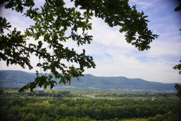 View from the hill to the mountains and the river