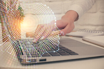 Multi exposure of woman hands working on computer and brain hologram drawing. Ai concept.