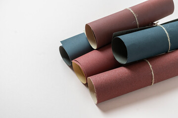 set of different color sandpaper rolls, industrial grain texture sheet