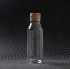 transparent empty glass water isolated with a cork