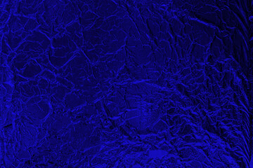 Dark blue foil. Fantastic mystical space texture. Surreal background with copy space for text, design. Horror, Halloween