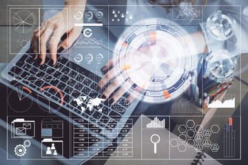 Double exposure of woman hands working on computer and data theme hologram drawing. Tech concept.