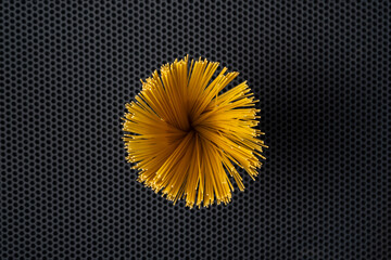 beautiful raw flower of spaghetti, top view from above