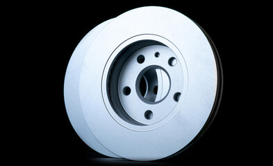 Mechanic part. New metal car part. Auto motor mechanic spare or automotive piece isolated on black background. Automobile engine service with space for text.