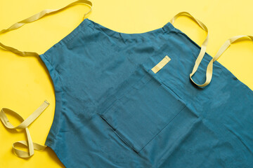 flat lay of apron textile isolated on color surface