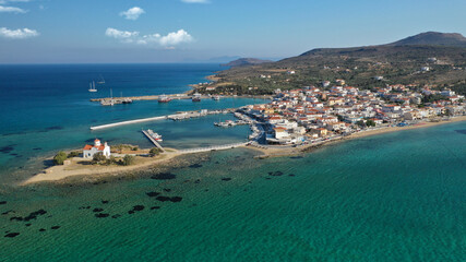 Obraz premium Aerial drone photo of picturesque seaside main village of Elafonisos island, Lakonia, Peloponnese, Greece