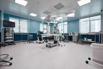 Fototapeta na wymiar Operating room with modern equipment, spacious bright operating room, operating unit ready for surgery