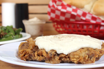 Chicken Fried Steak and Gravy With Mashed Potatoes in Rural Cafe Restaurant