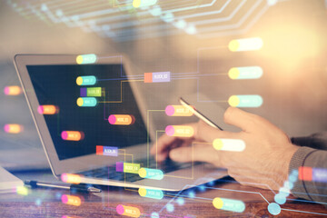 Multi exposure of man's hand holding and using a digital device and data theme drawing. Innovation concept.