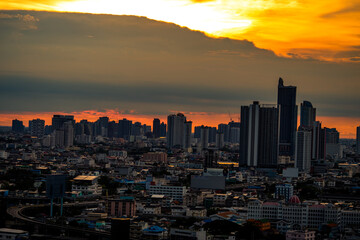 panoramic high-angle evening background of the city view,with natural beauty and blurred sunsets in the evening and the wind blowing all the time,showing the distribution of city center accommodation