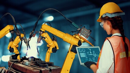 Smart industry robot arms modernization for innovative factory technology . Concept of automation...