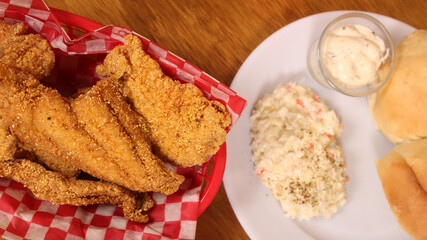 Fried Catfish With Coleslaw and French Fries in Rural Cafe