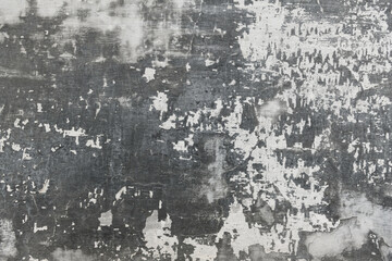 abstract gray painted old wall for background or texture, peeling paint and stucco with cracks like grunge style