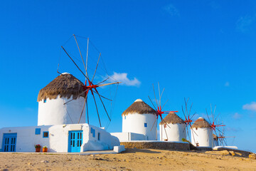 Close on the first of the windmills with blue sky in Mykonos island cyclades Greece - 440251896