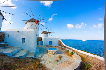 Panoramic view of two windmills and their bases Mykonos Greece Cyclades - 440252431