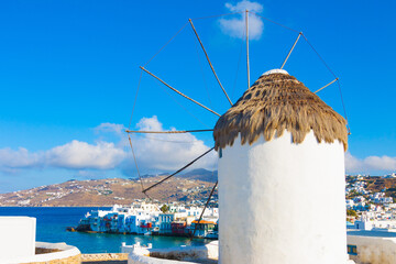 Rear shoot of windmill with little Venice  background in Mykonos island in cyclades Greece - 440252611