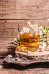 Tea from rose hips flowers, vitamin drink, hard light, dark shadow