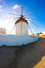 Windmill with sun from behind in Mykonos Island Greece Cyclades - 440253208