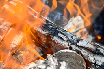 burning fire with coals in the grill
