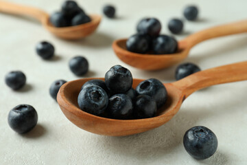 Fresh berry concept with blueberry on white textured table