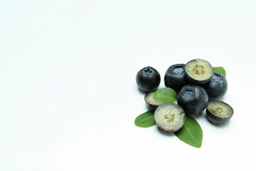 Fresh blueberry with leaves on white background