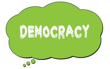 DEMOCRACY text written on a green thought bubble.